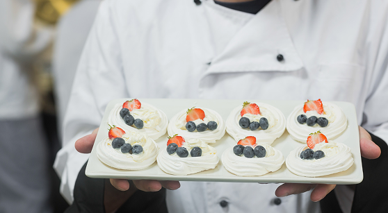 Prepared food presented by a chef